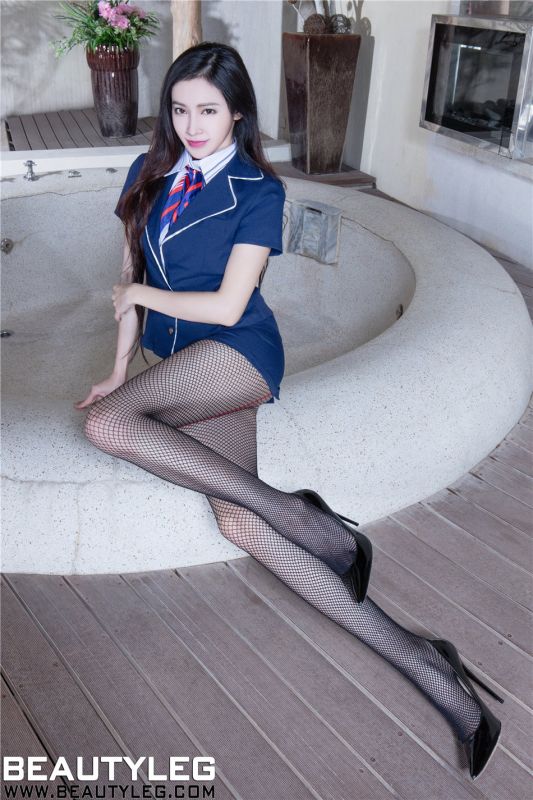 空姐Avril黑丝网袜室内写真高清图片